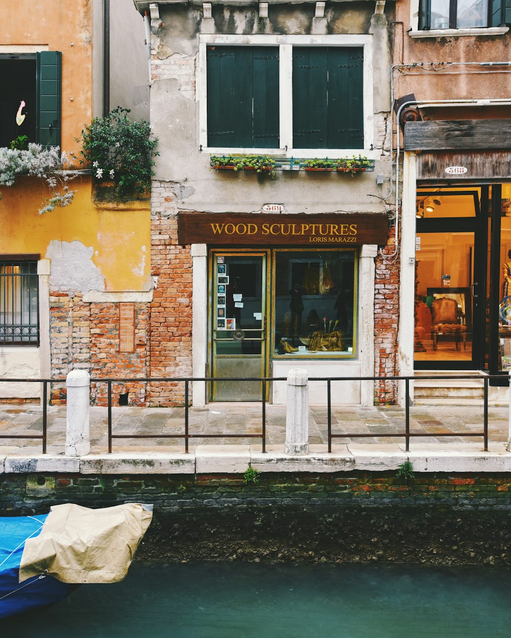 brown brick building with glass window