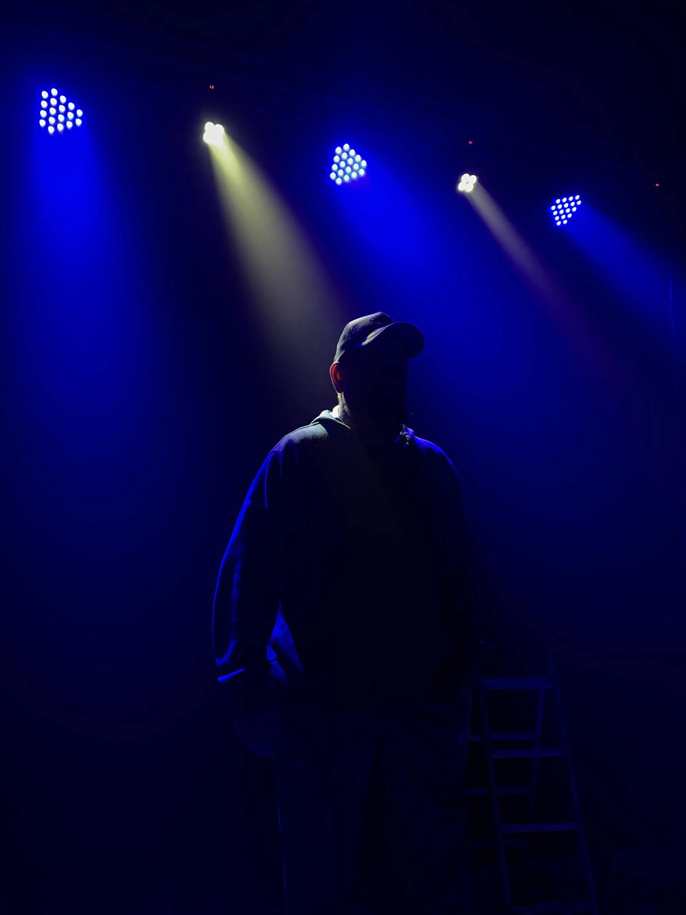 Live stage production with lighting
