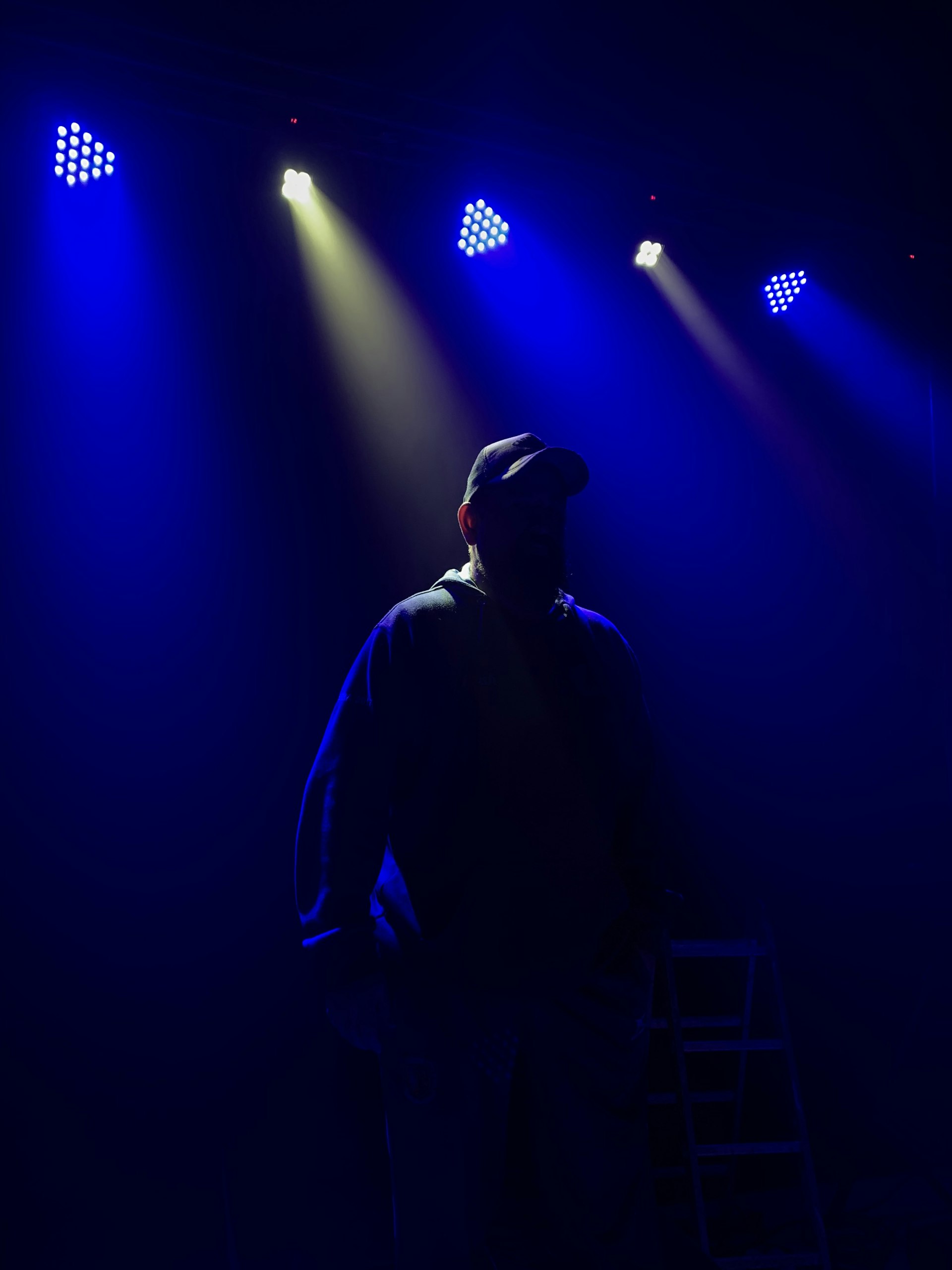Two actors working a scene together in an intimate rehearsal space