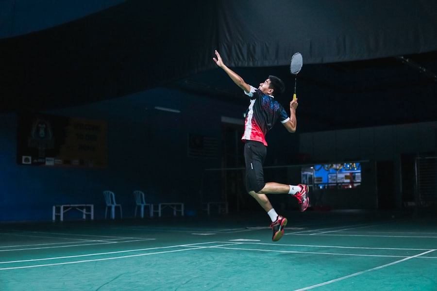 Badminton player leaping into an overhead smash