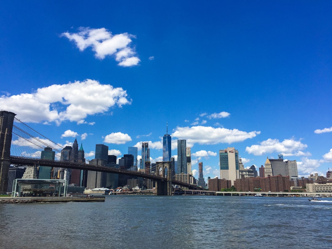 city skyline under blue sky during daytime