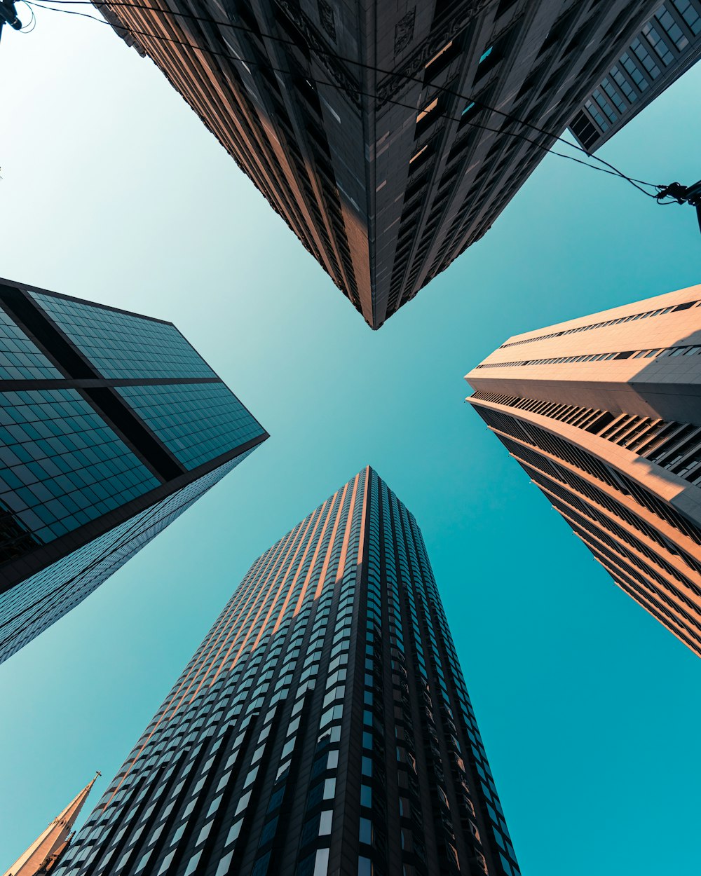 low angle photography of high rise buildings