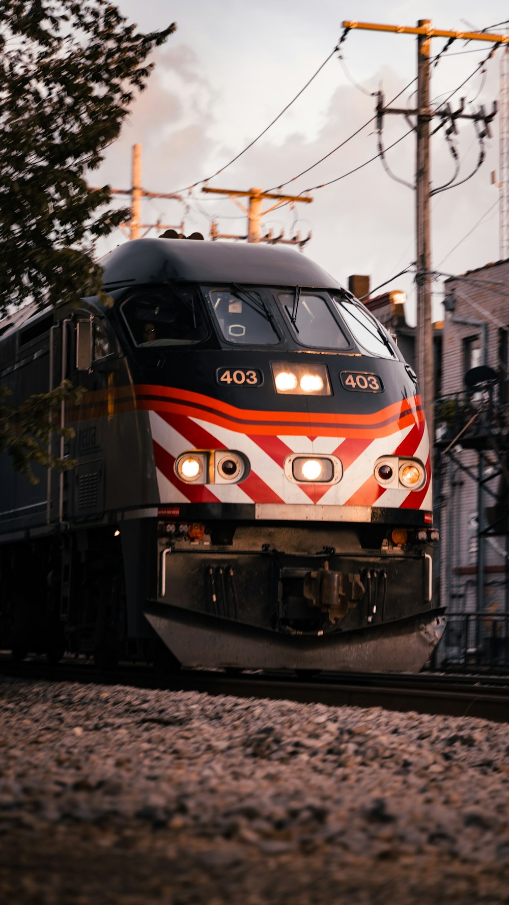 red yellow and blue train on rail tracks