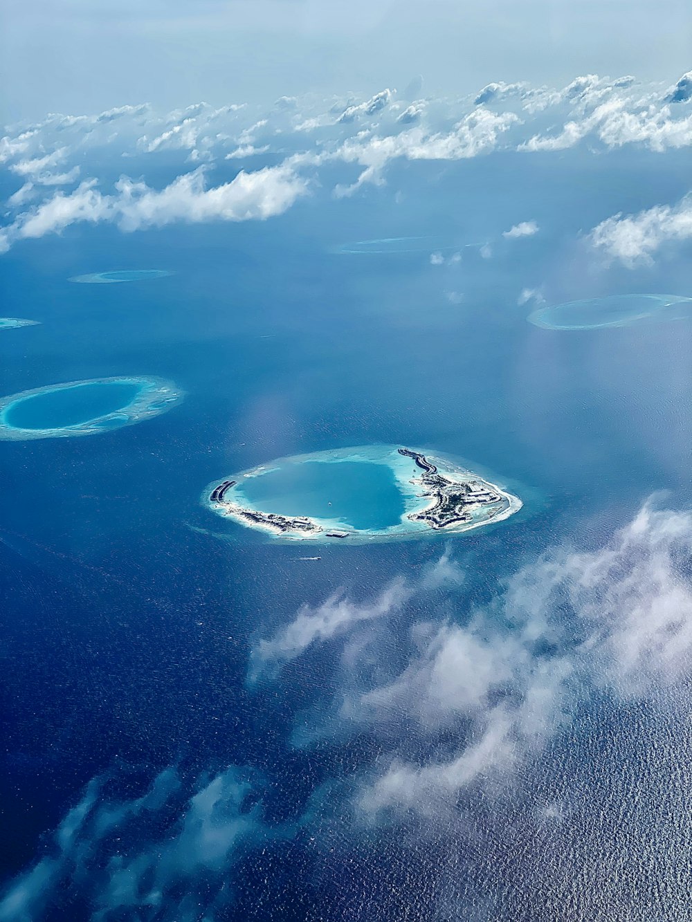 aerial view of island under blue sky