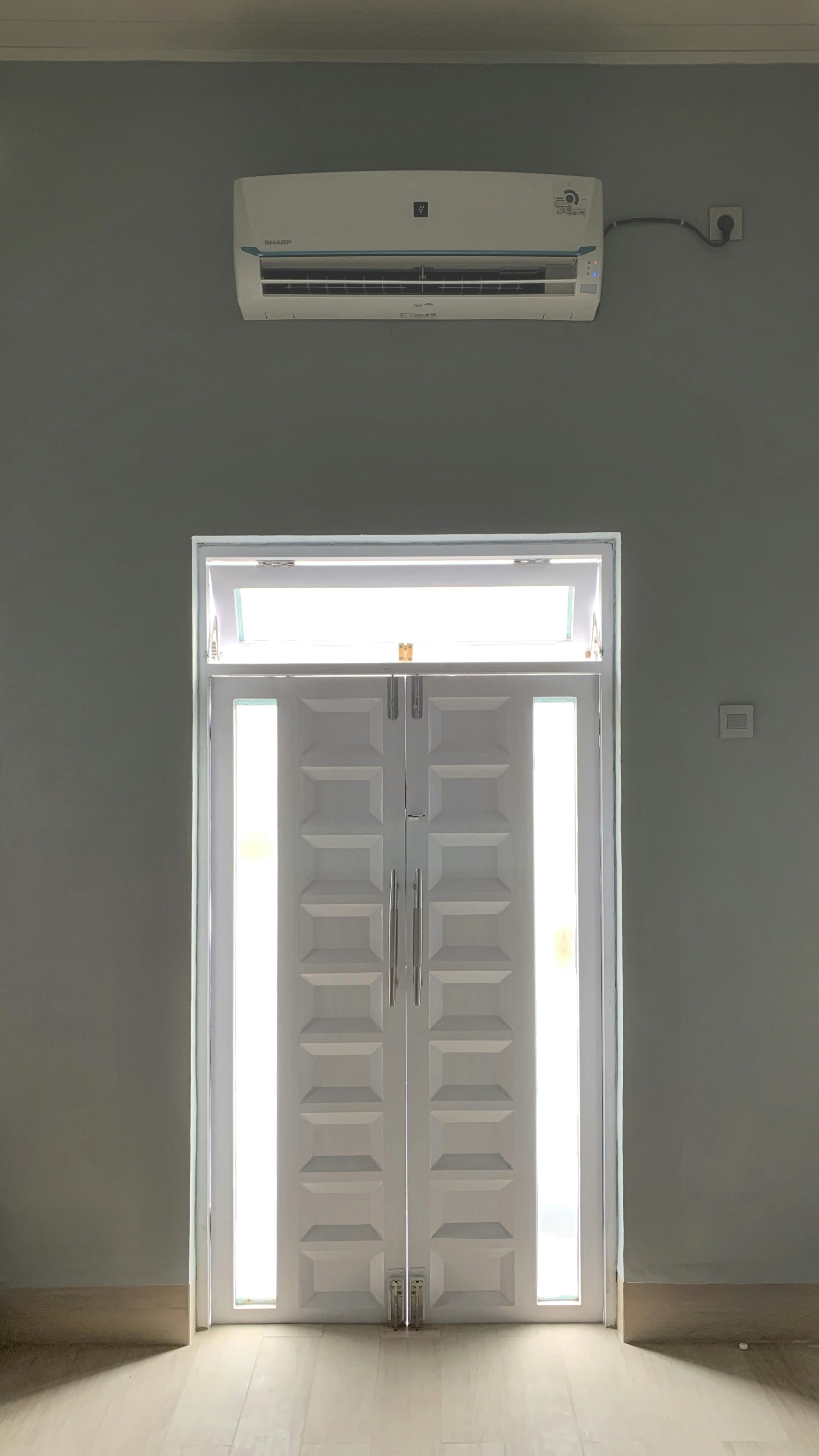 Interior view of a customized walk-in refrigerator with shelving and lighting