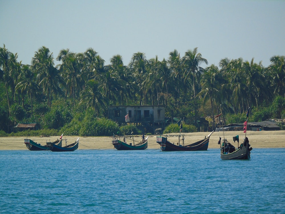 people riding on boat on lake during daytime