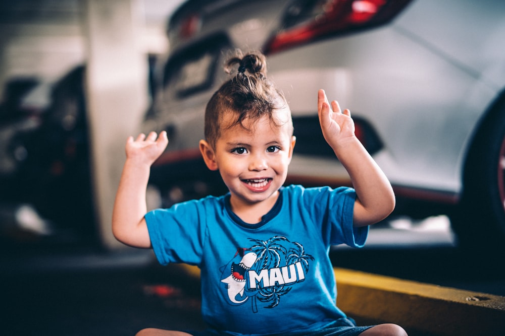 boy in blue crew neck t-shirt