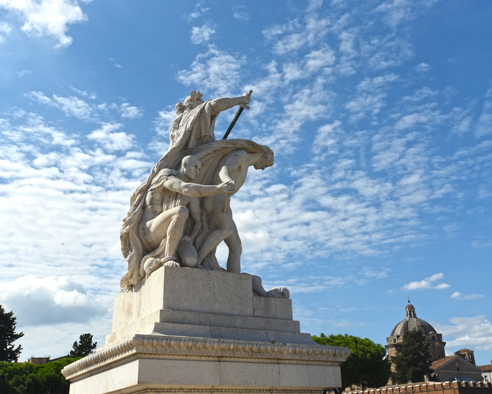 white horse statue under blue sky during daytime