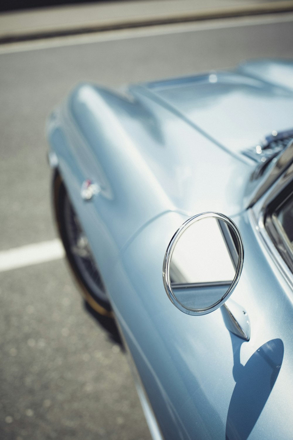 blue car with silver door handle