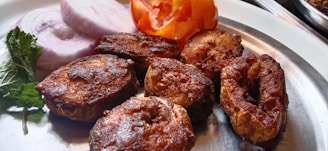 brown chocolate cookies on white ceramic plate