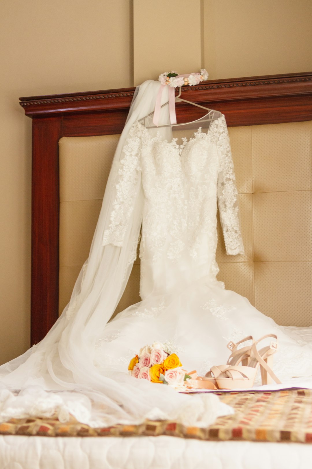 white wedding dress on white textile