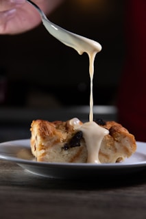 Warm bread puddings served in elegant bowls.