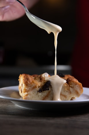 Warm bread puddings served in elegant bowls.