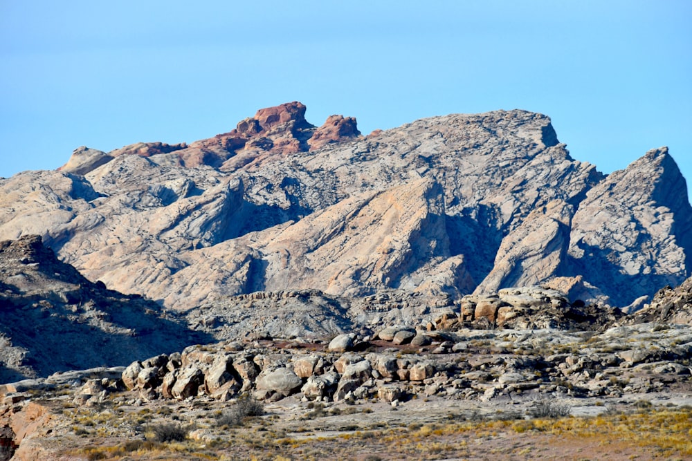 brown rocky mountain under blue sky during daytime