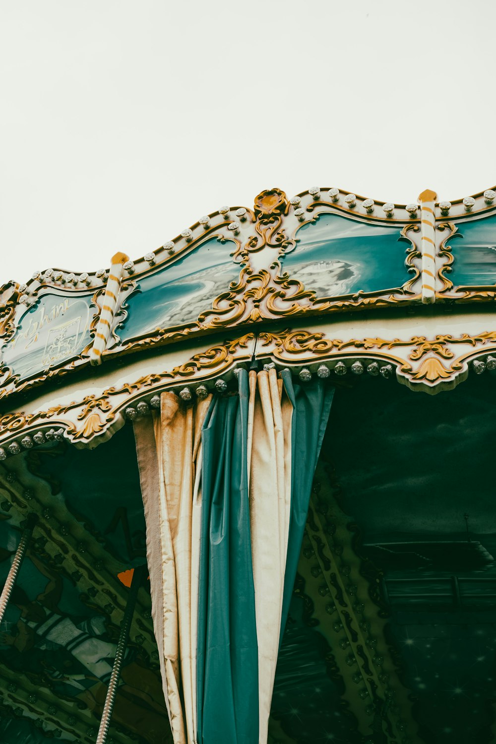 white and brown carousel with lights