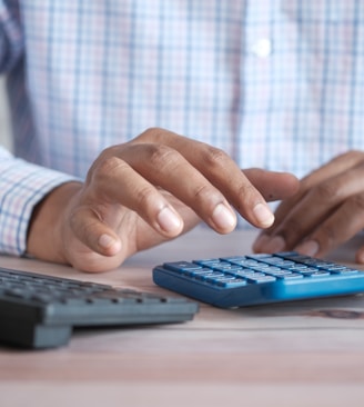 person using black computer keyboard