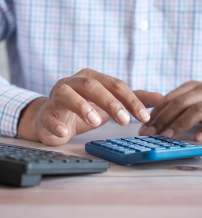 person using black computer keyboard