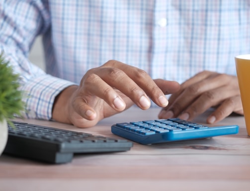 person using black computer keyboard