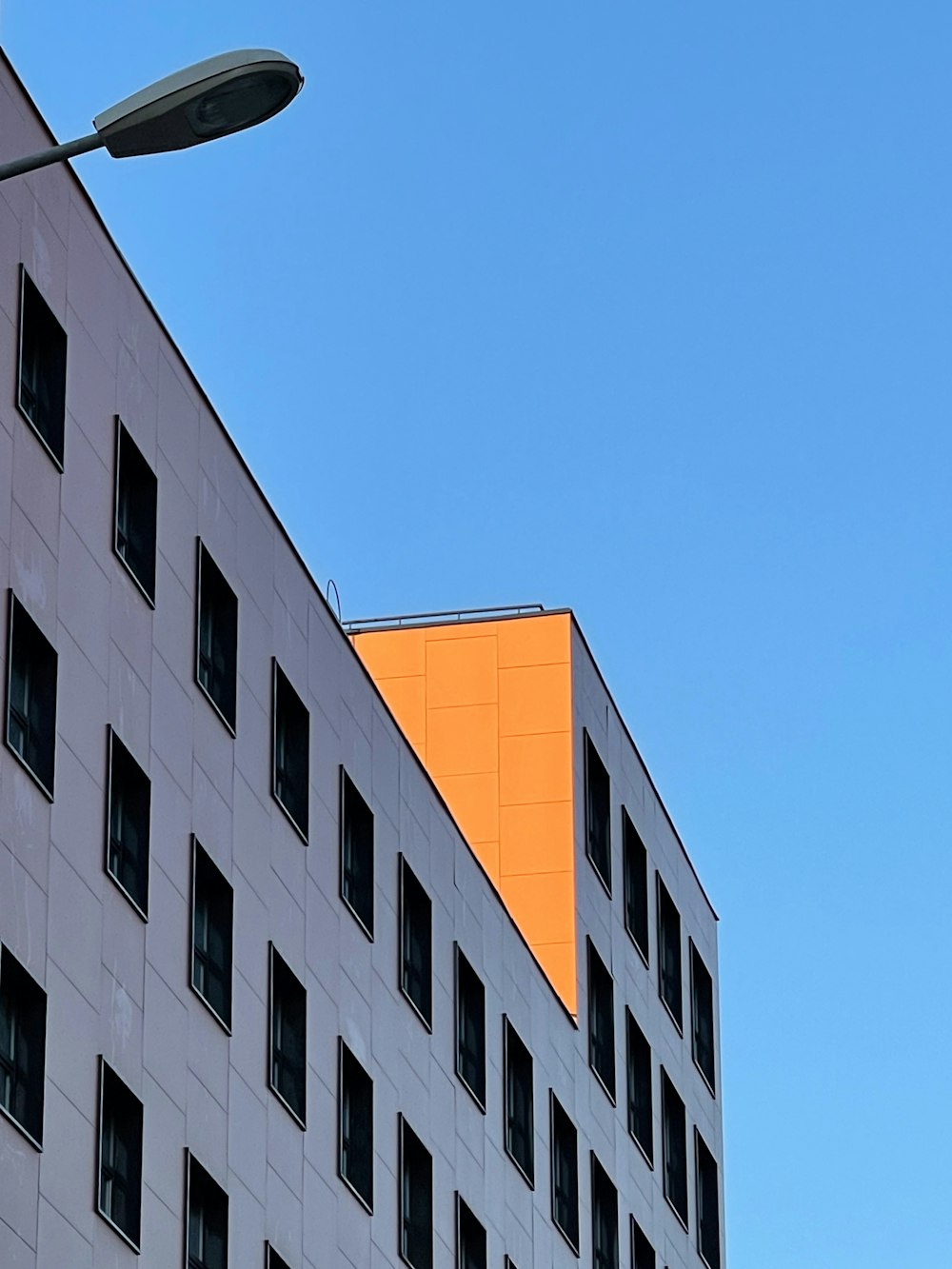 white and brown concrete building under blue sky during daytime