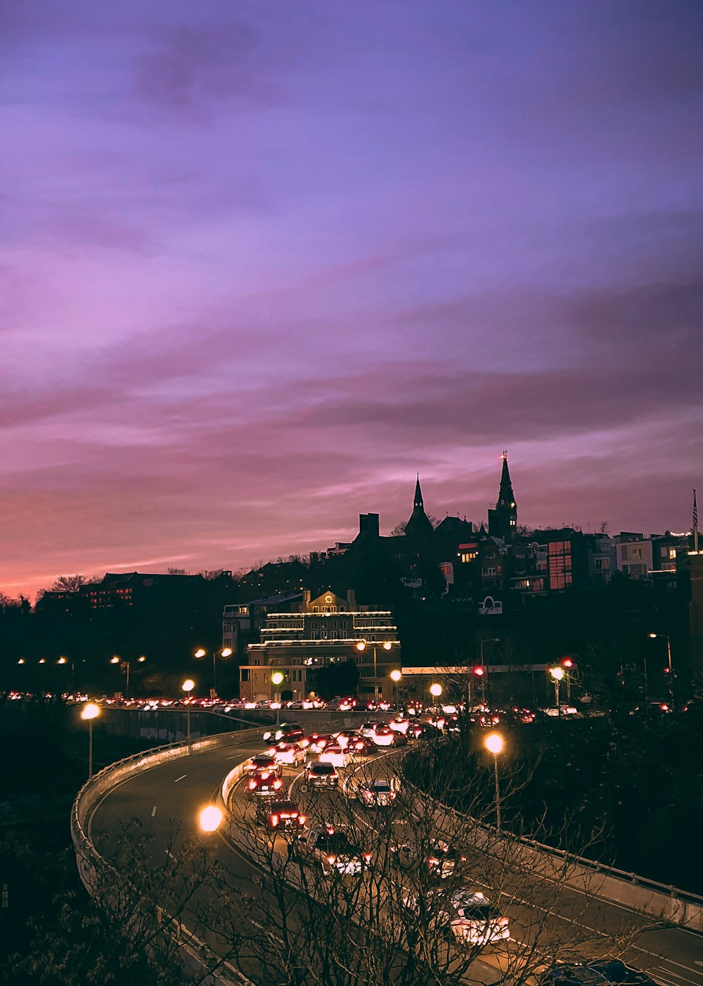 city with high rise buildings during night time