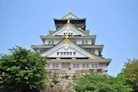 white and green temple under blue sky during daytime