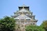 white and green temple under blue sky during daytime