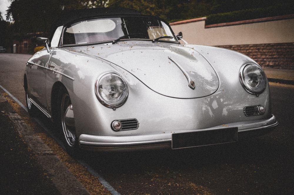 white porsche 911 on road during daytime