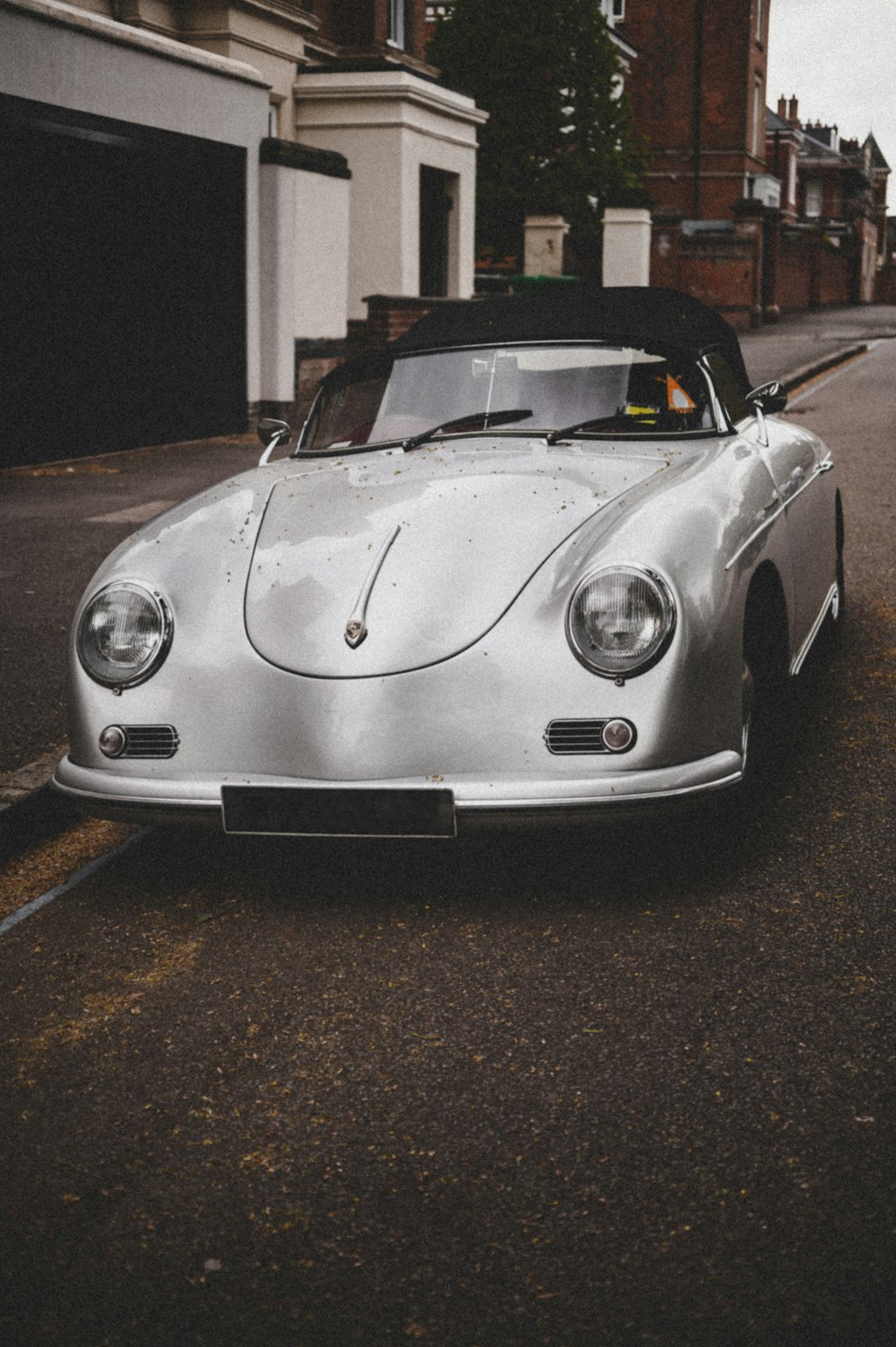 white porsche 911 on road during daytime