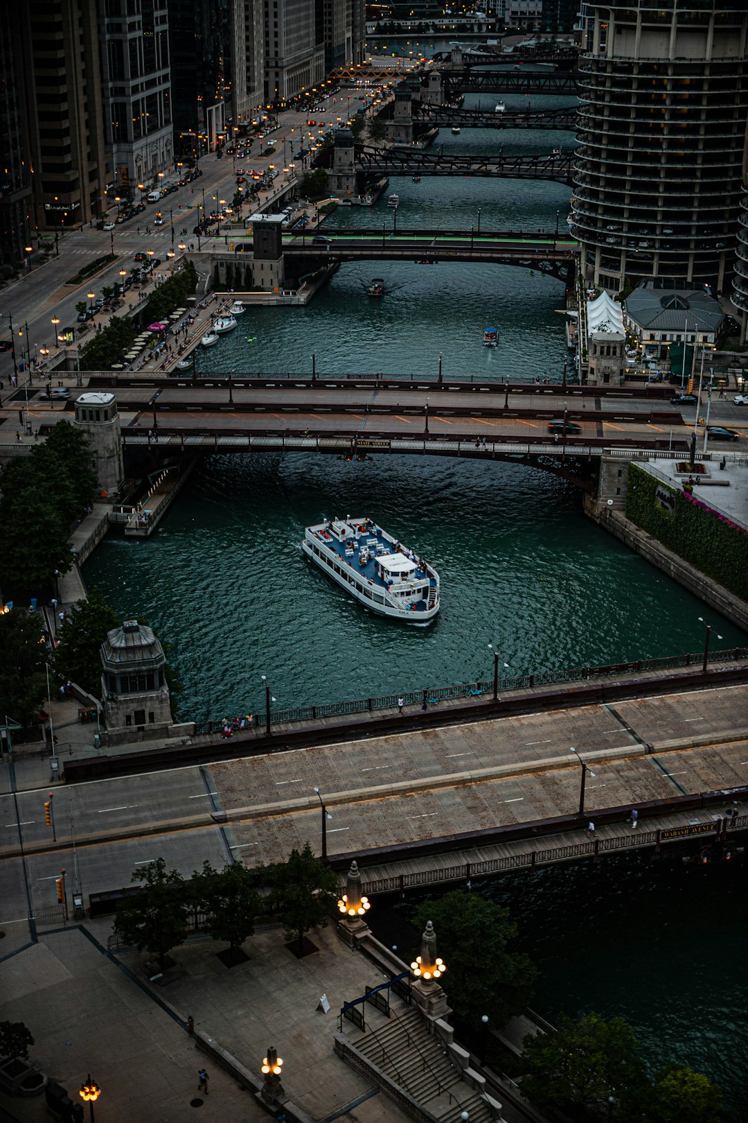 white and green boat on water during daytime