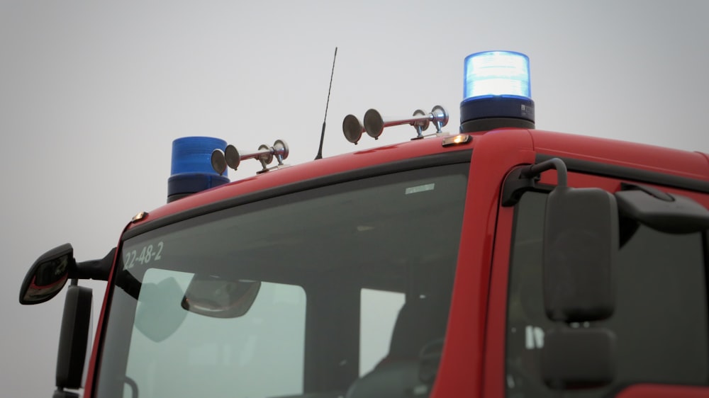 red and white car during daytime