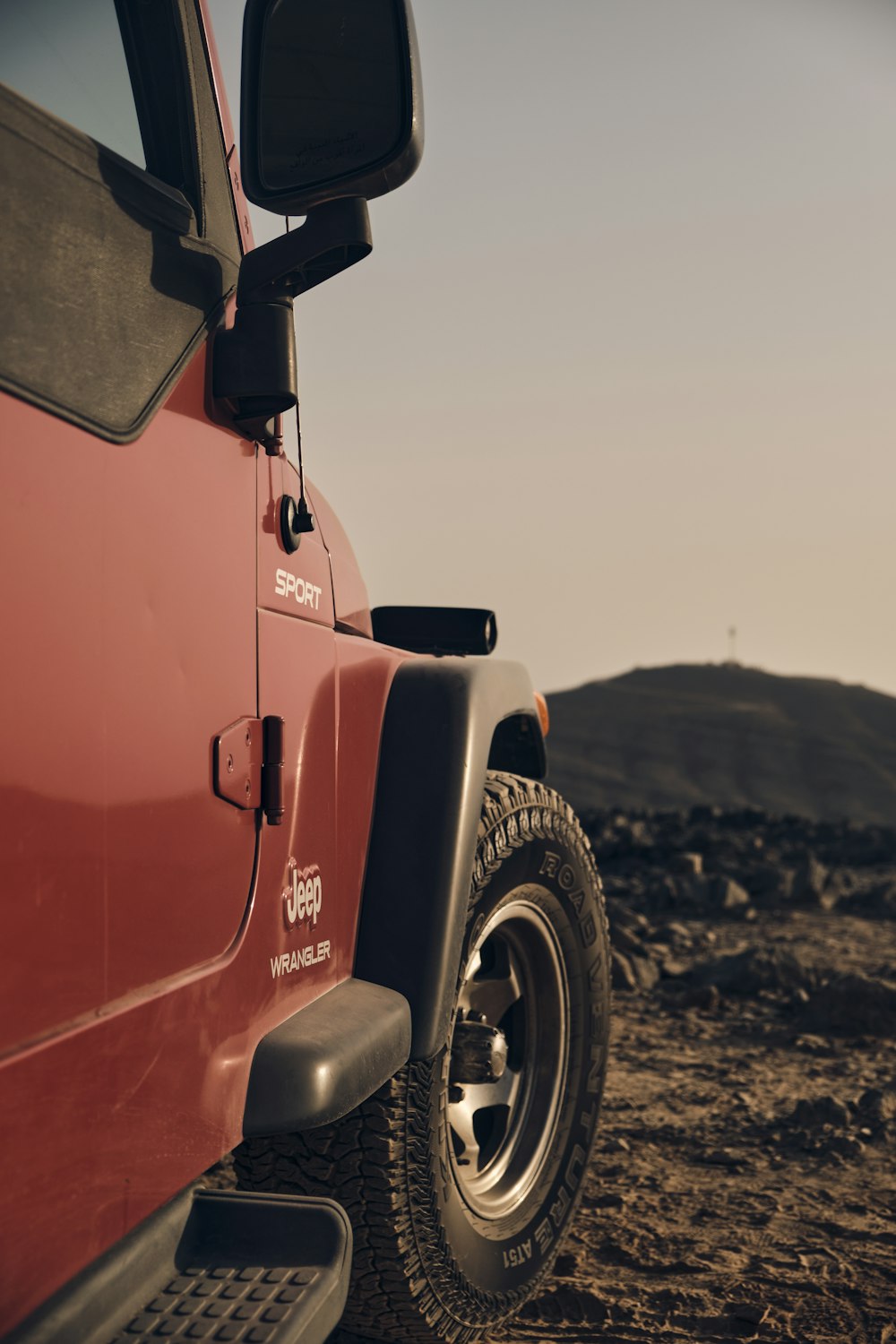 orange and black jeep wrangler