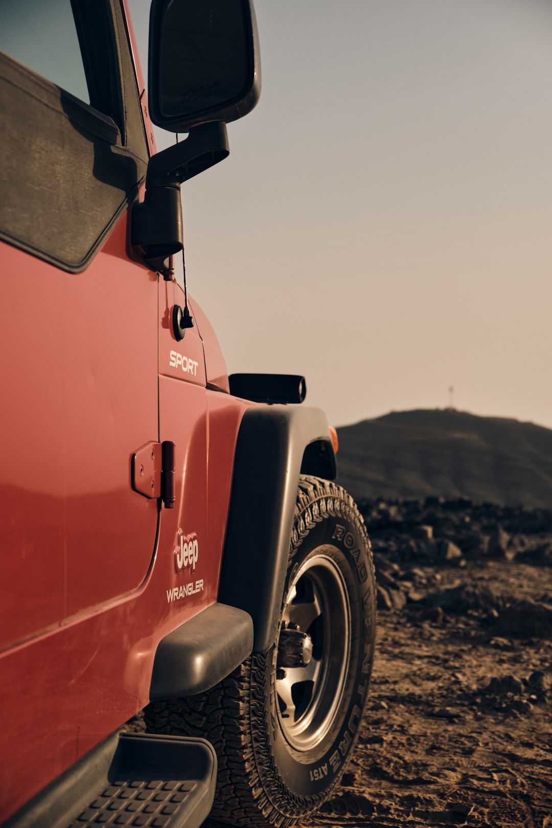 orange and black jeep wrangler