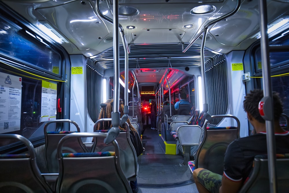 people sitting on bus seat