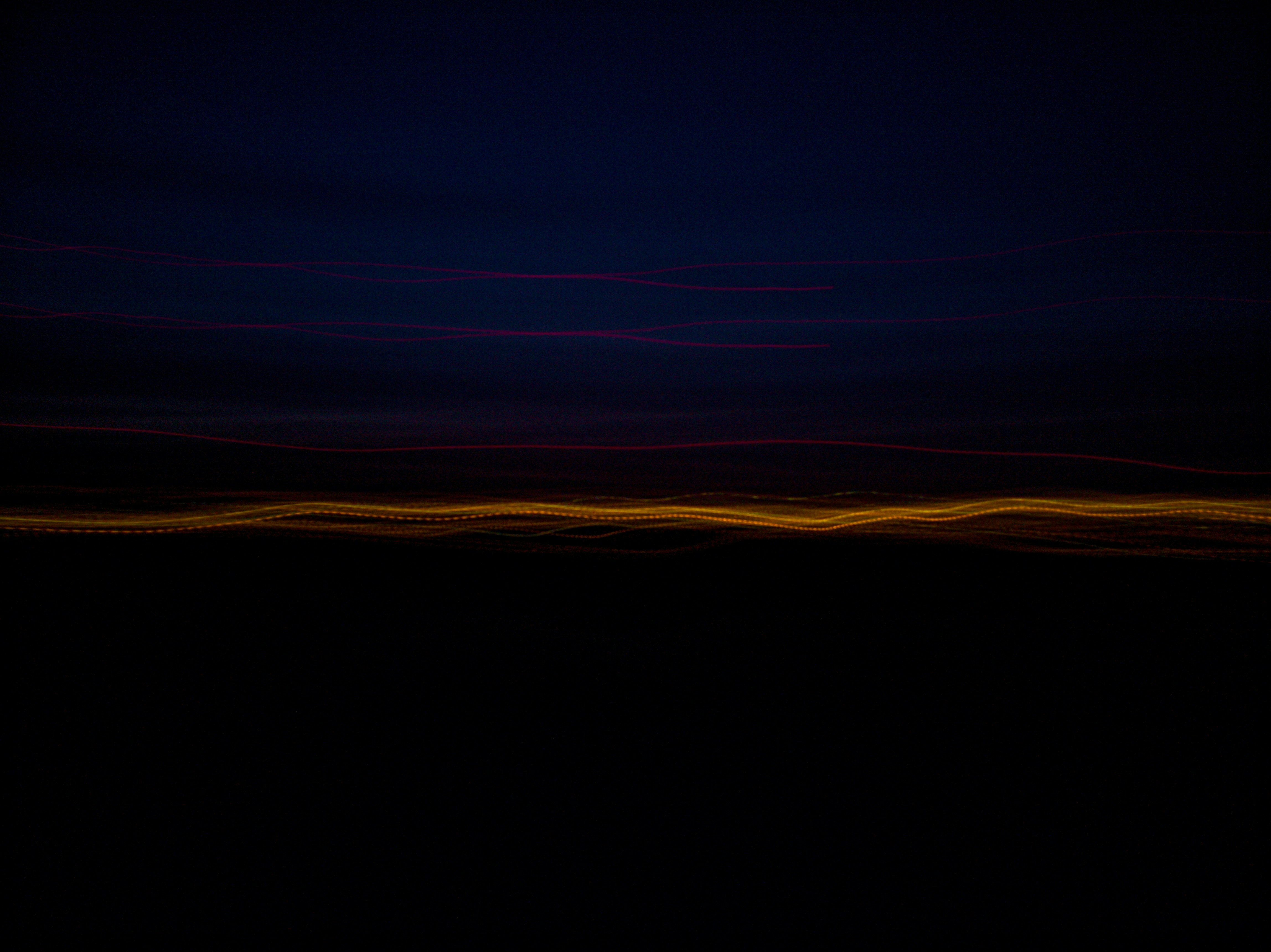 silhouette of mountain during sunset