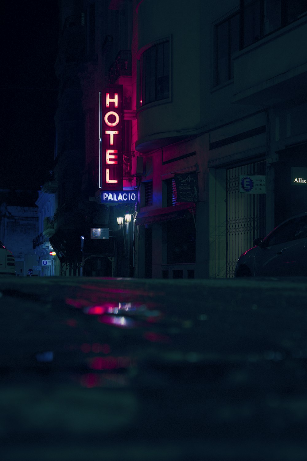 red and white open neon signage