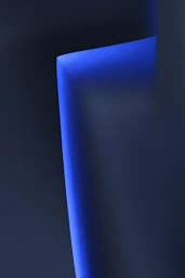 black flat screen tv turned on displaying blue screen