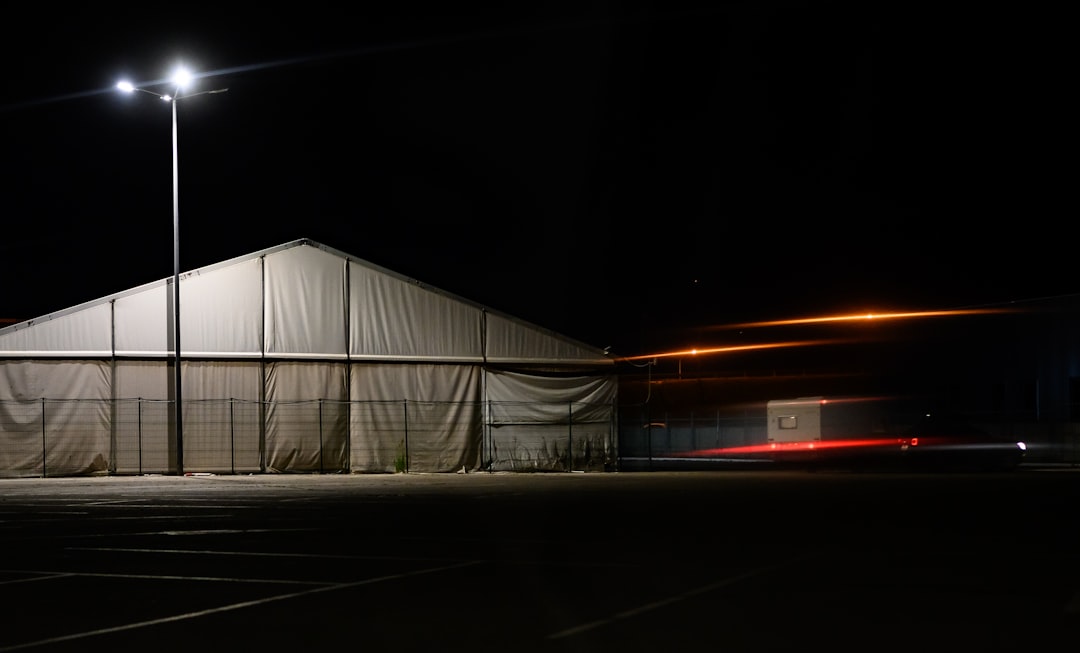 white and gray building during night time