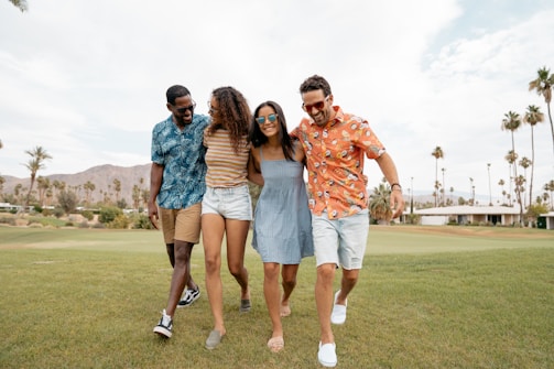 A group of friends enjoying a sunny day in fashionable summer outfits