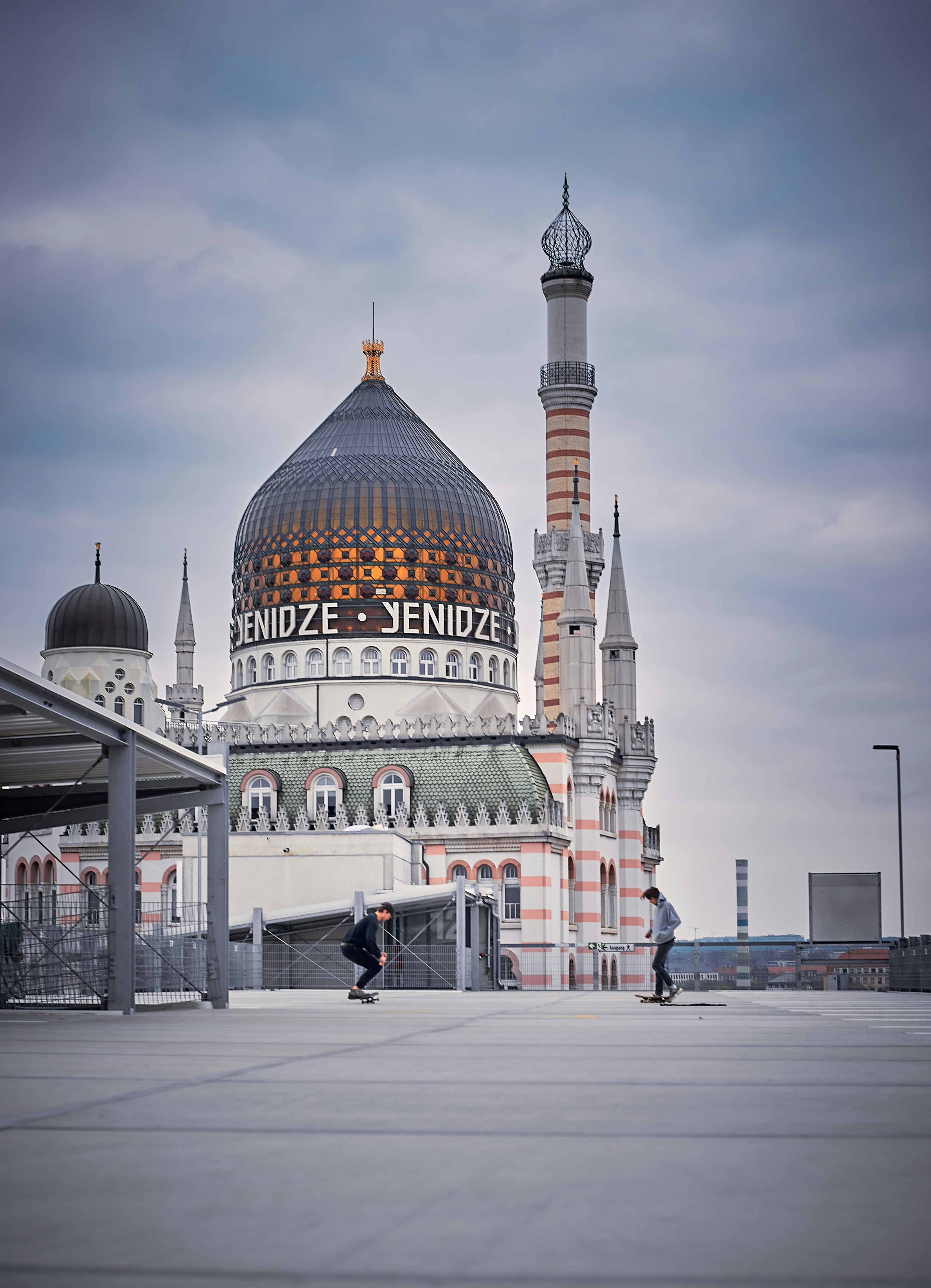 people walking near brown and white dome building during daytime