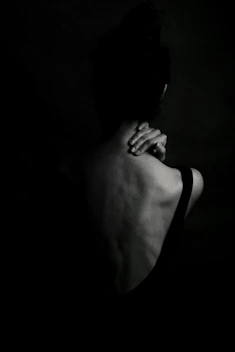 woman in black tank top