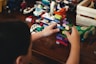 child playing with lego blocks