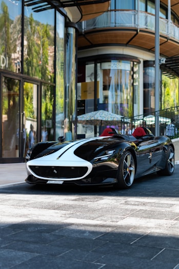 black and red ferrari sports car