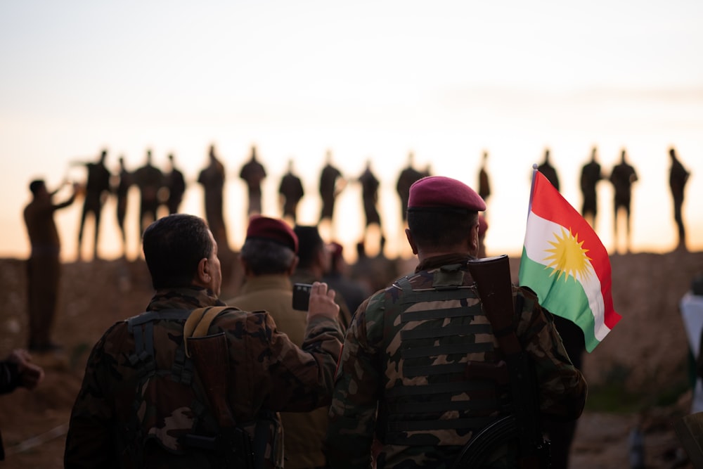 group of soldiers holding flags