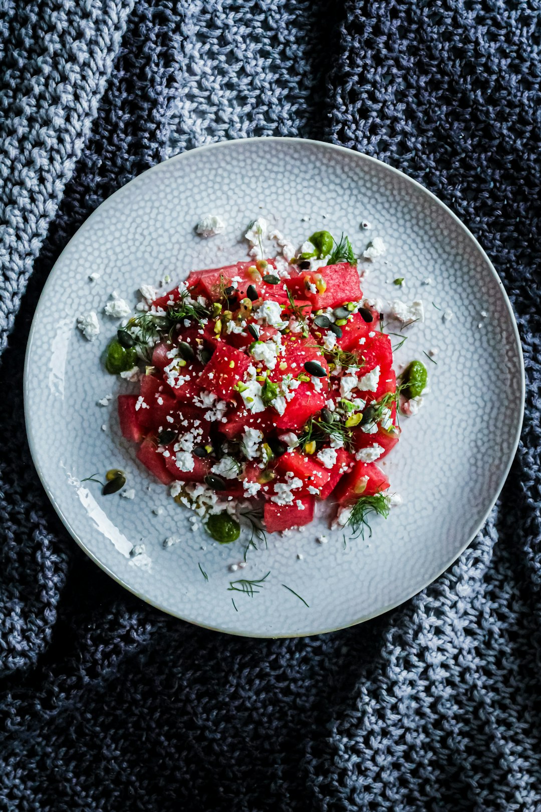 red and green vegetable salad on white ceramic plate