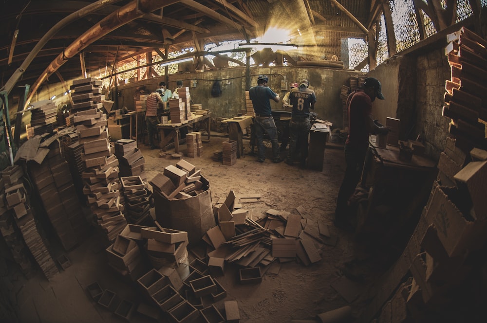 people standing and sitting inside building