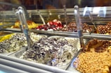 Close-up of colorful Italian gelato scoops in a rustic setting.