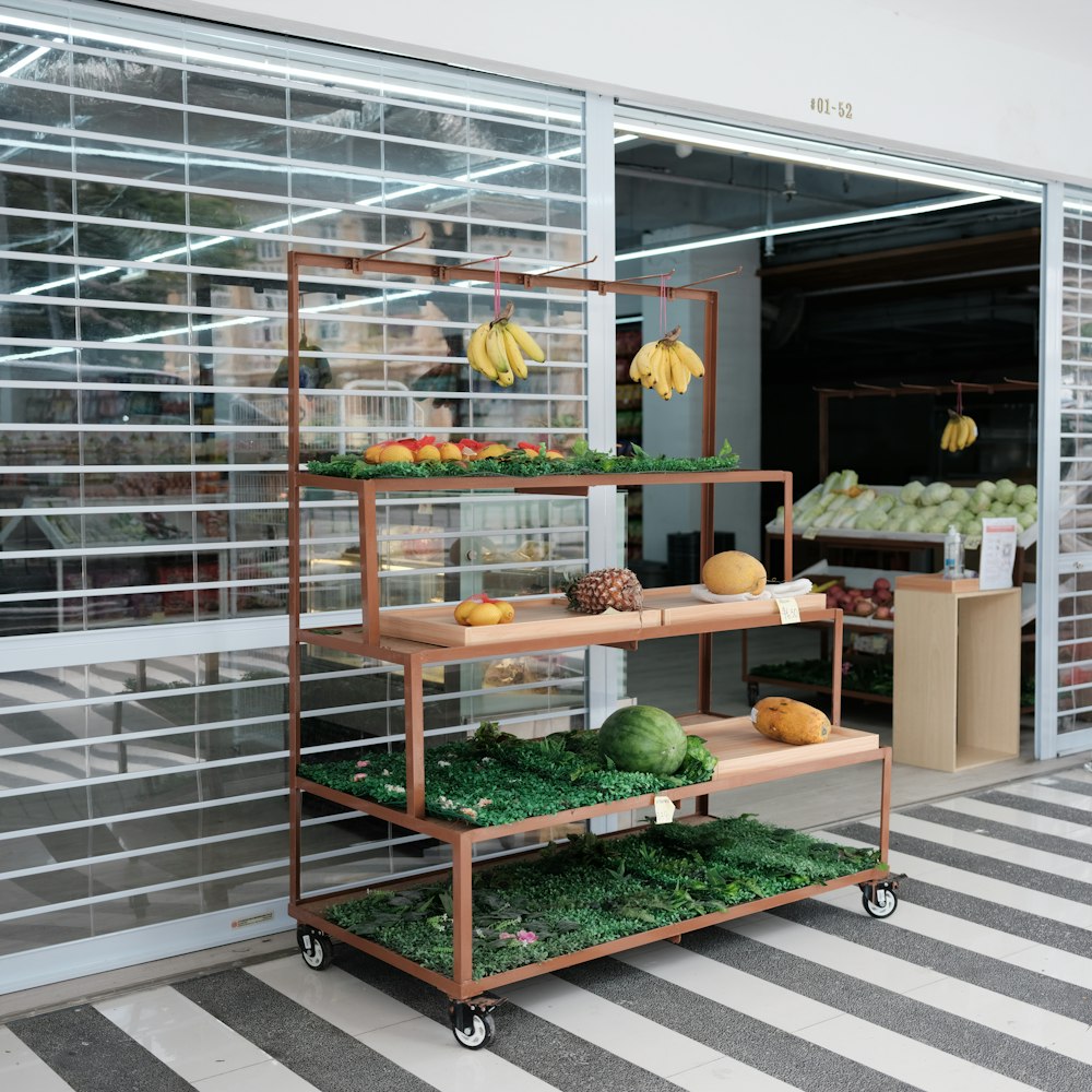 green fruit on green fruit rack