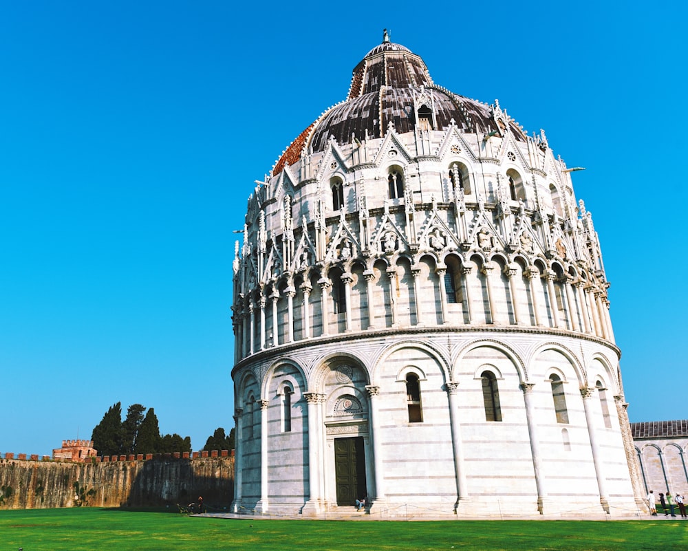 white concrete dome building under blue sky during daytime