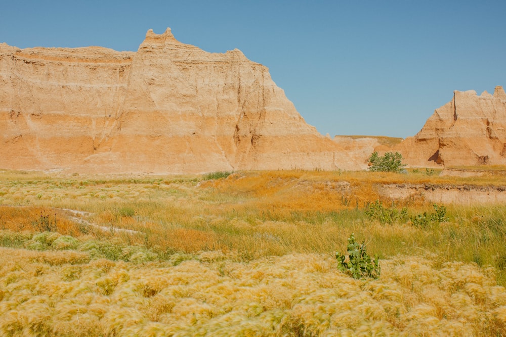 brown rock formation under blue sky during daytime