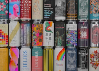 assorted cans and cans on table